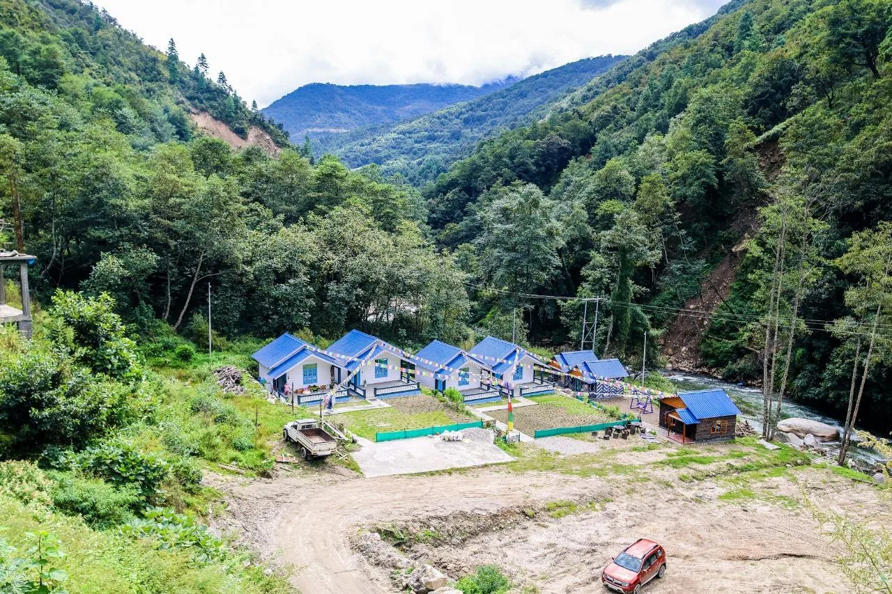 Aerial view with mountain backdrop
